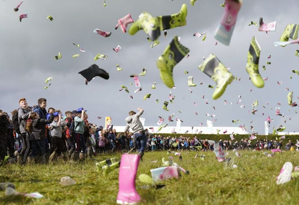 Some 995 people take part in a world record bid - the most people throwing wellies - at the National Ploughing Championships in Co Laois in September