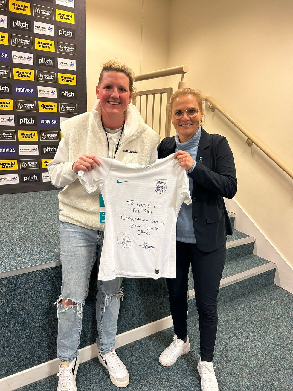 Sophie Downey with England manager Sarina Wiegman