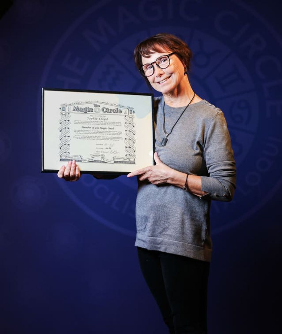 Sophie Lloyd with her Magic Circle certificate