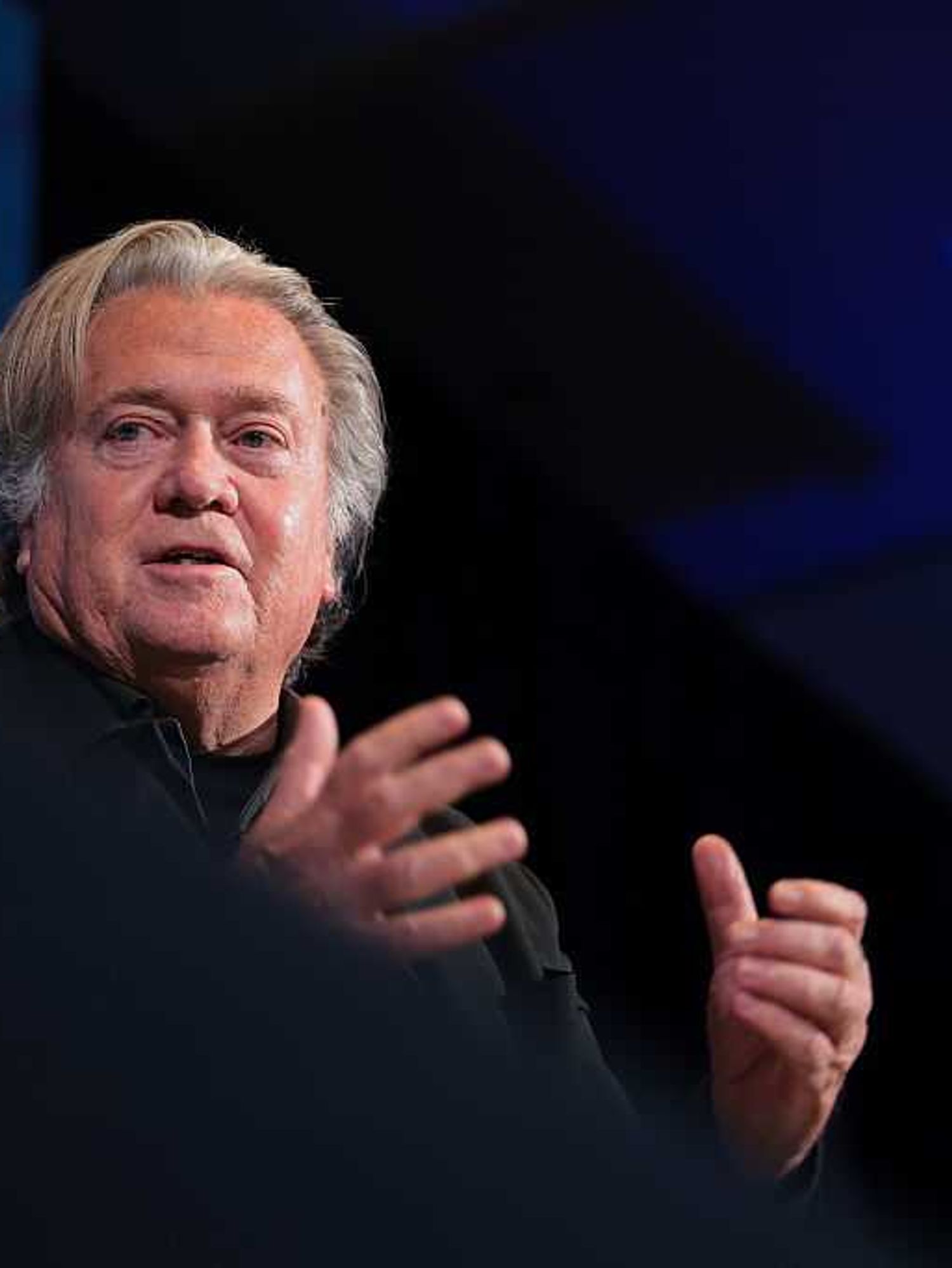 Steve Bannon speaking at an event.