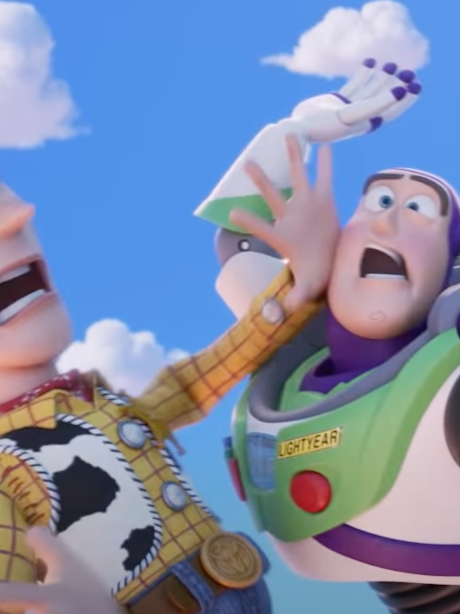 Still from an animated trailer for Toy Story, showing the cowboy Woody crashing into Buzz, a space ranger with a green and purple suit.