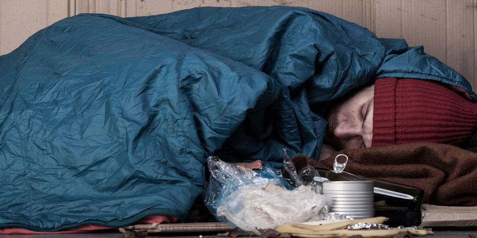 Stock image of a man sleeping rough