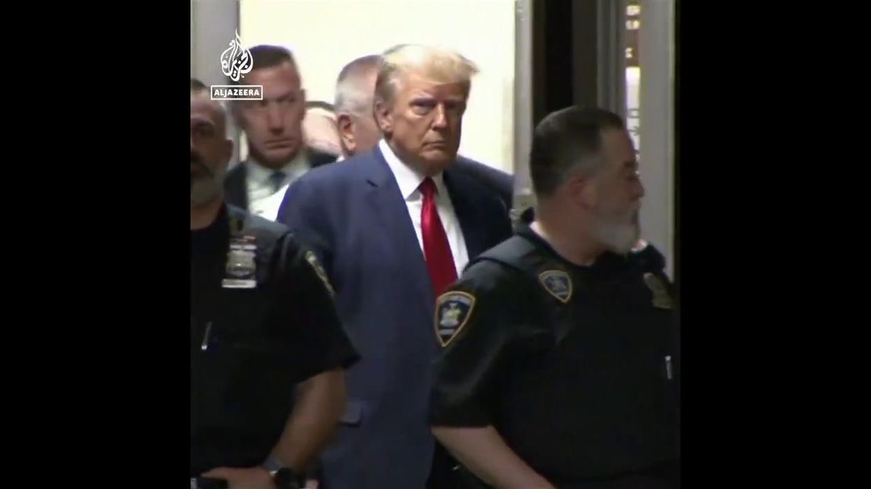 A guard at Trump's court hearing has become an instant icon