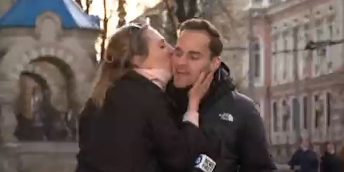 Stranger interrupts live broadcast by kissing reporter in very awkward clip