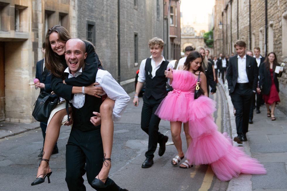 Cambridge University students enjoy their first May Balls since before pandemic