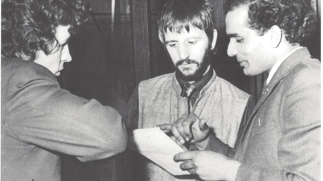 Suresh Joshi (right) with Ringo Starr in 1968 (Suresh Joshi/PA)