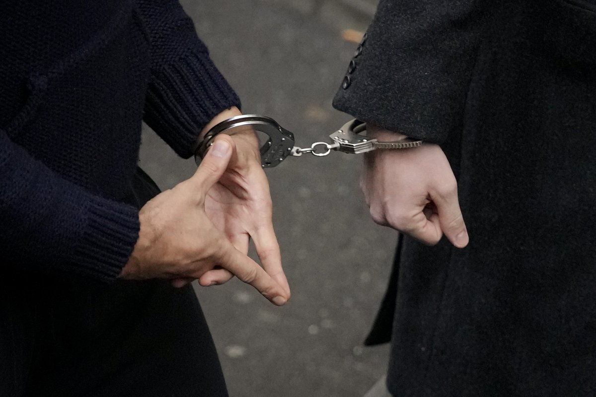 What is the meaning behind Andrew Tate's mysterious hand sign? | indy100