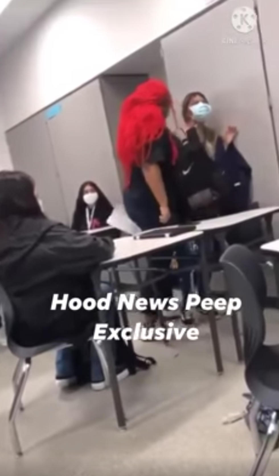 Teacher breathes on cornered student