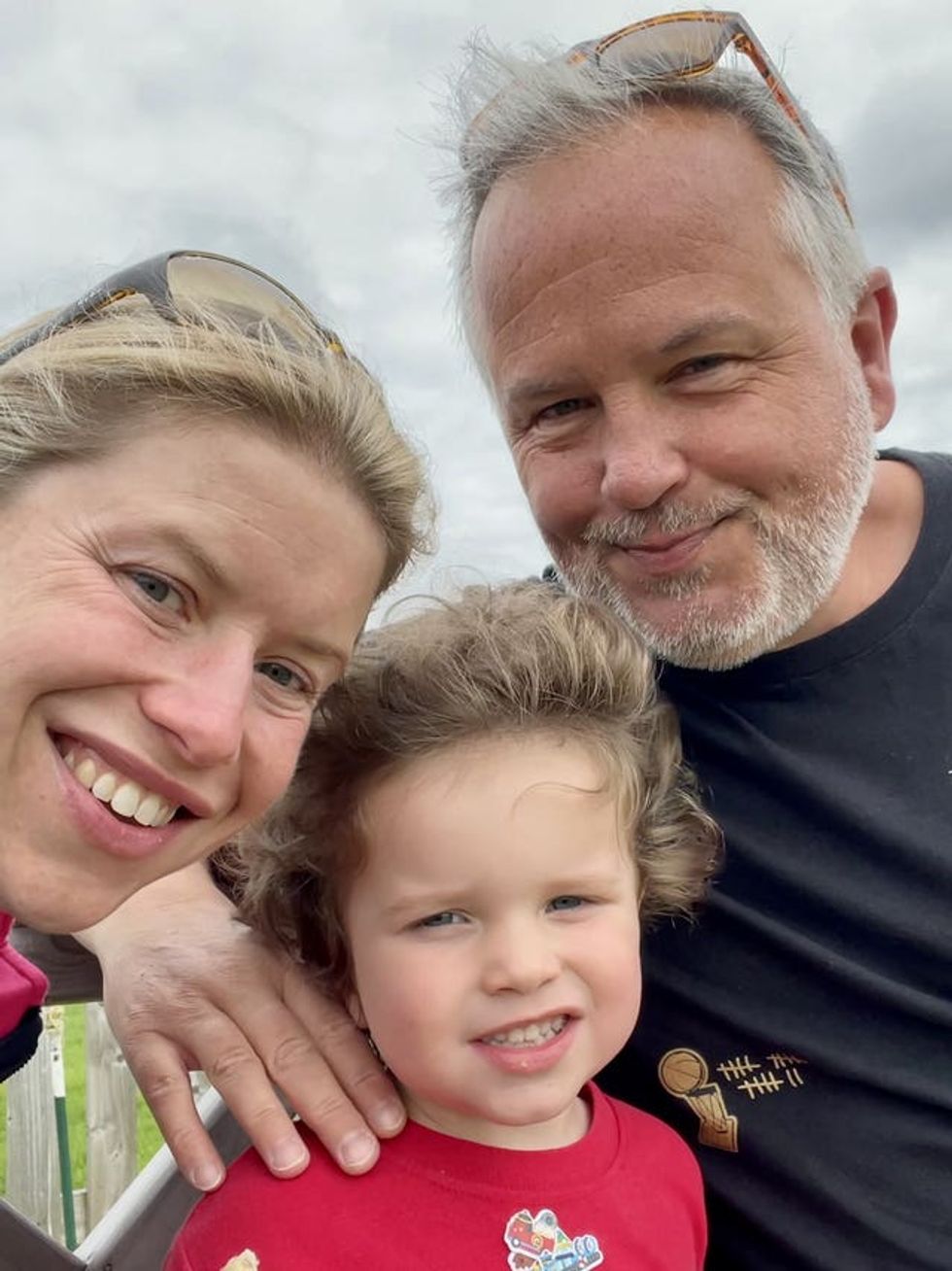 Teddy Slade with his parents Amy and Dan