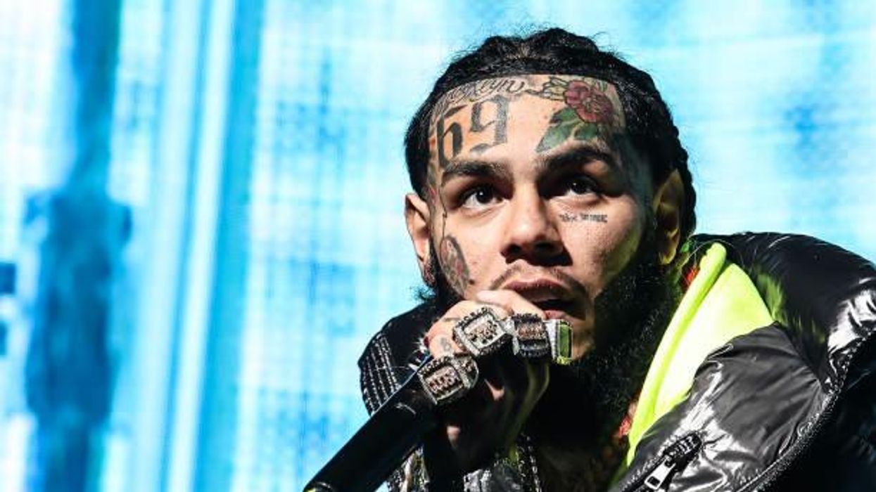 Rapper 6ix9ine gives family $50k in video - but fans are now worried for their safety