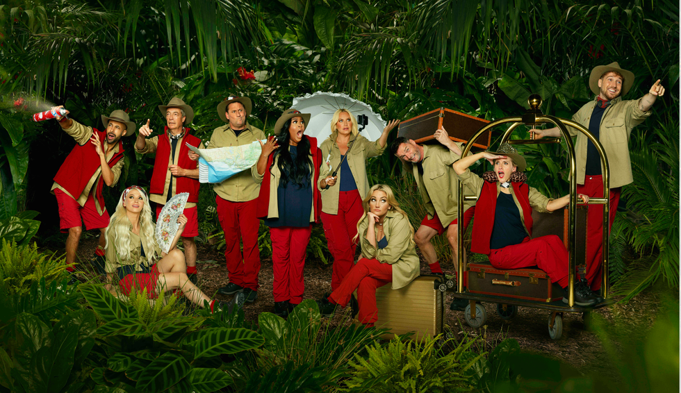 Ten celebrities striking poses in the middle of a jungle.