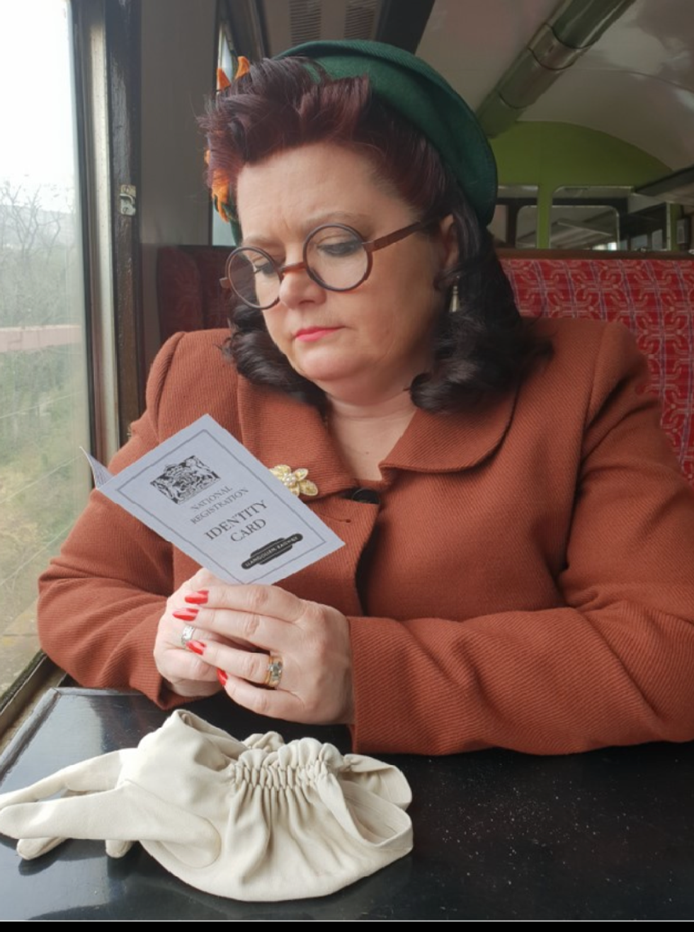 Teresa Fisher, 50, from Stone in Staffordshire, dressed in one of her 1940s outfits.