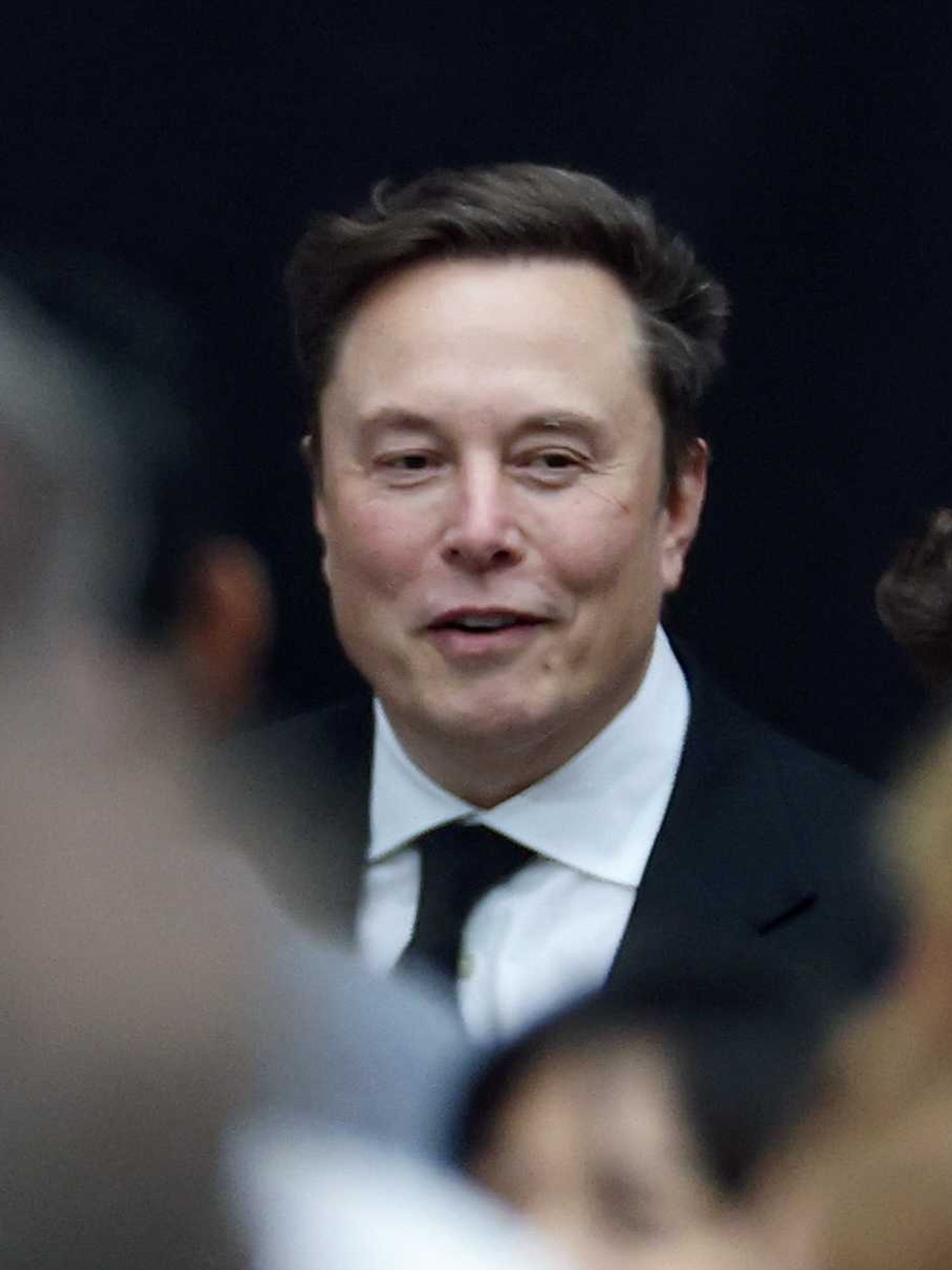Tesla CEO Elon Musk attends the memorial service for political activist Charlie Kirk at State Farm Stadium on September 21, 2025 in Glendale, Arizona