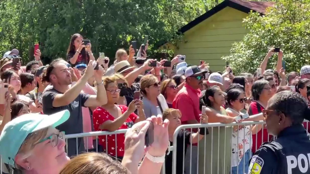 Texas governor booed as he visits site of the Uvalde school shooting