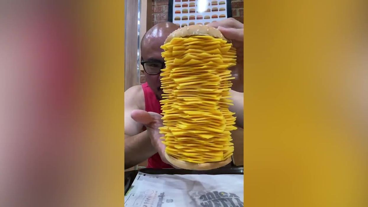 Foodie devours four of Burger King's controversial new burgers - containing 80 slices of cheese