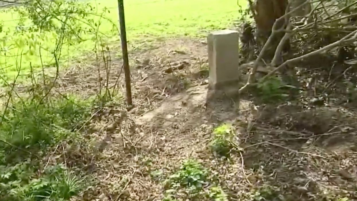 The 1819 border stone is pictured in its new position.