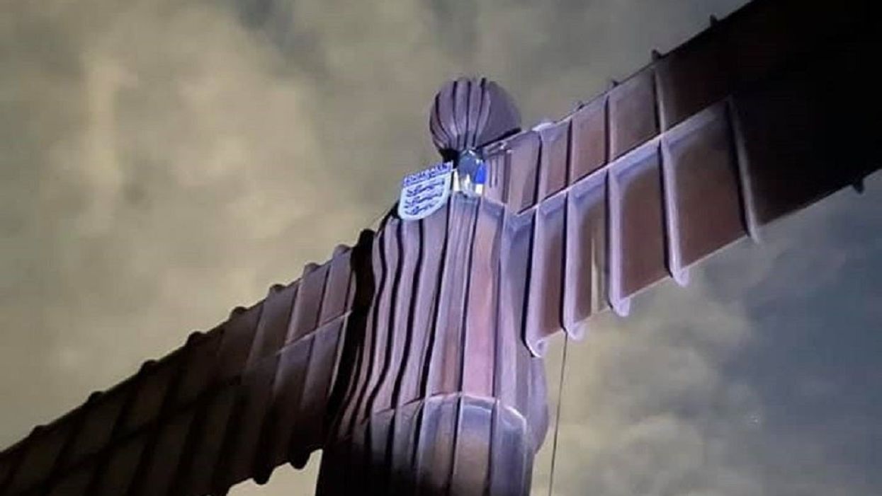The Angel of the North with an England badge