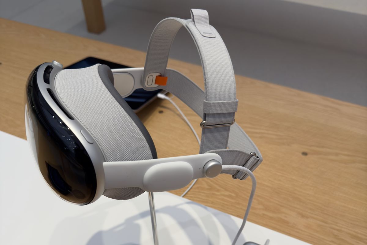 The Apple Vision Pro headset on display in an Apple store