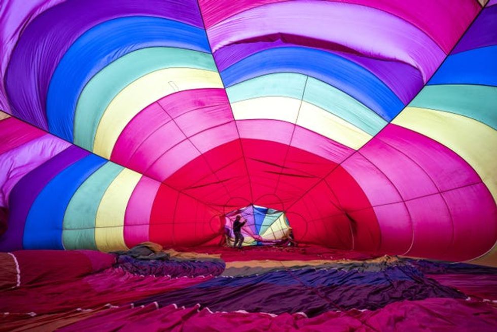 The balloons are all shapes, sizes and colours (Ben Birchall/PA)