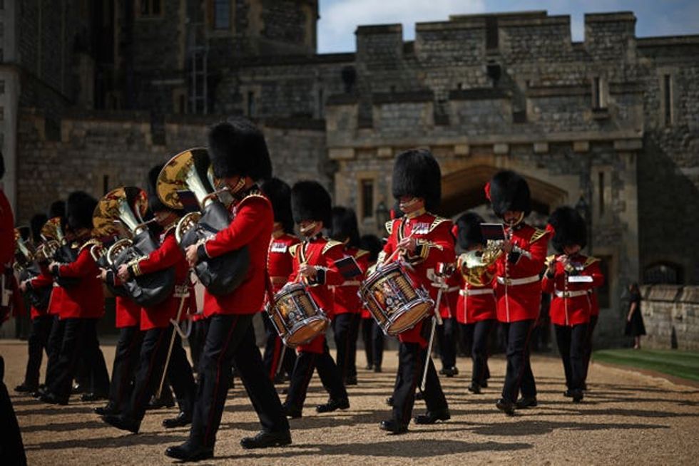 The Band of the Coldstream Guards enter the Quadrangle during a ceremony at Windsor Castle