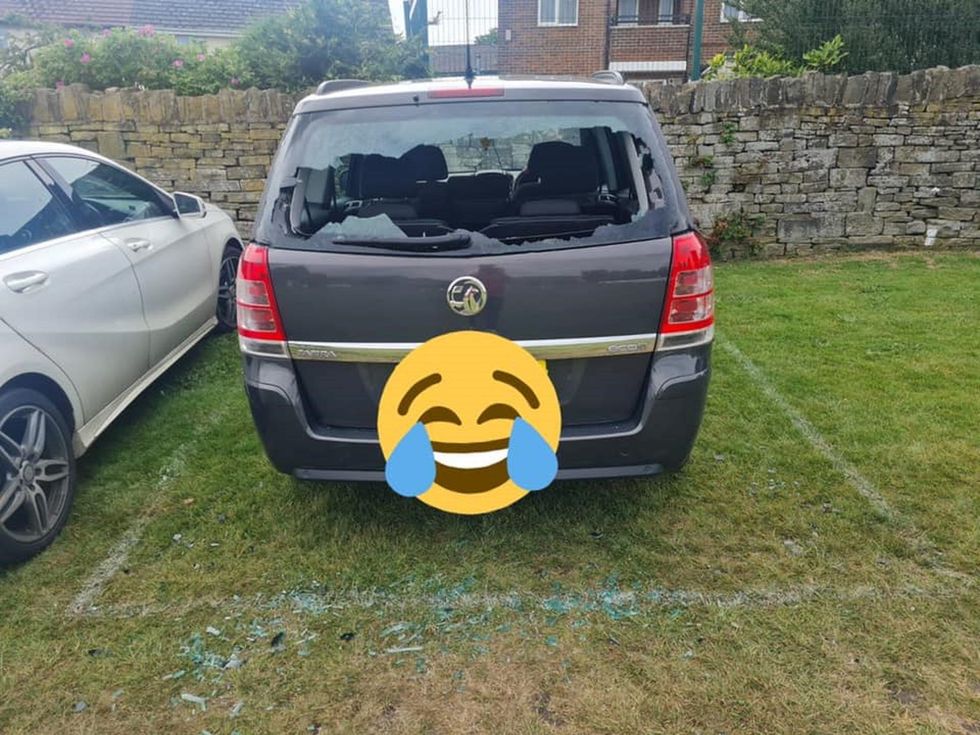 The car of an unlucky batsman, who hit a cricket ball through his own window