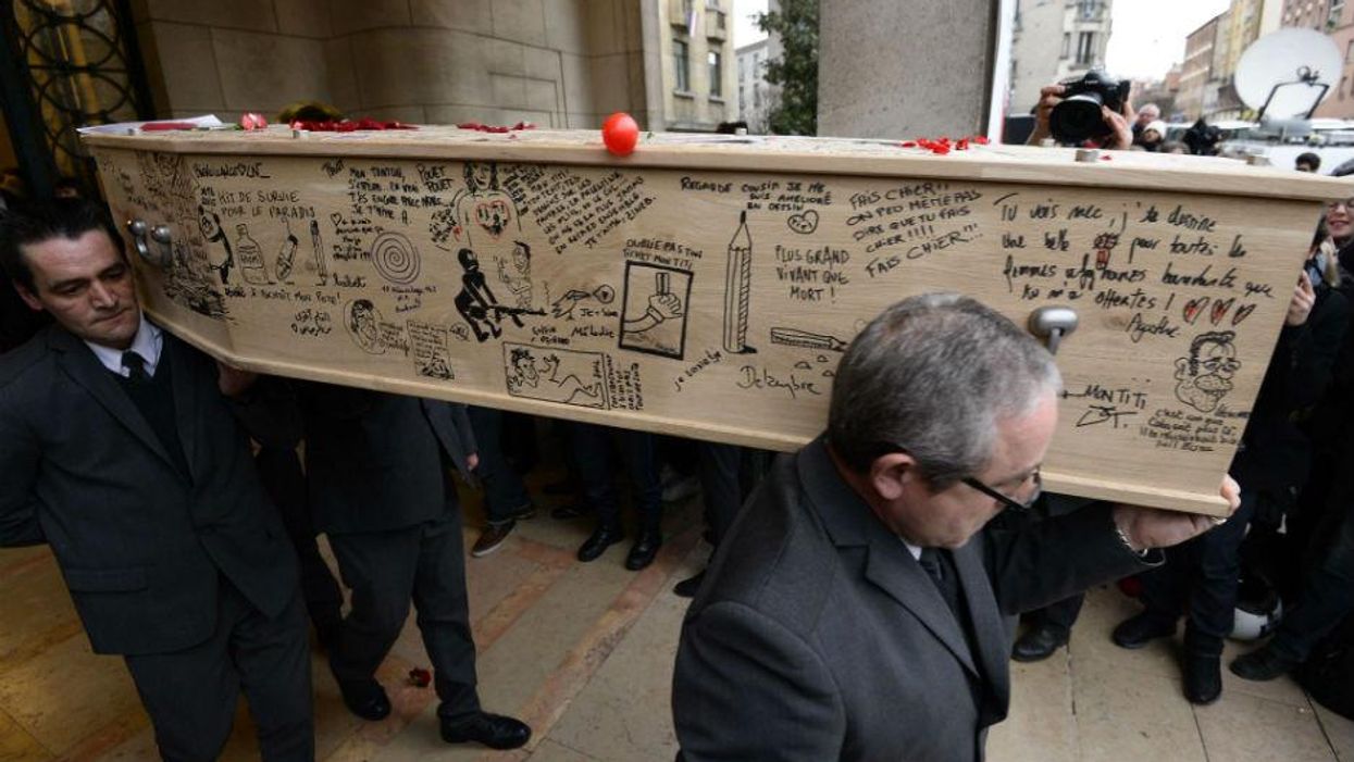 The coffin of Bernard "Tignous" Verlhac at Montreuil town hall