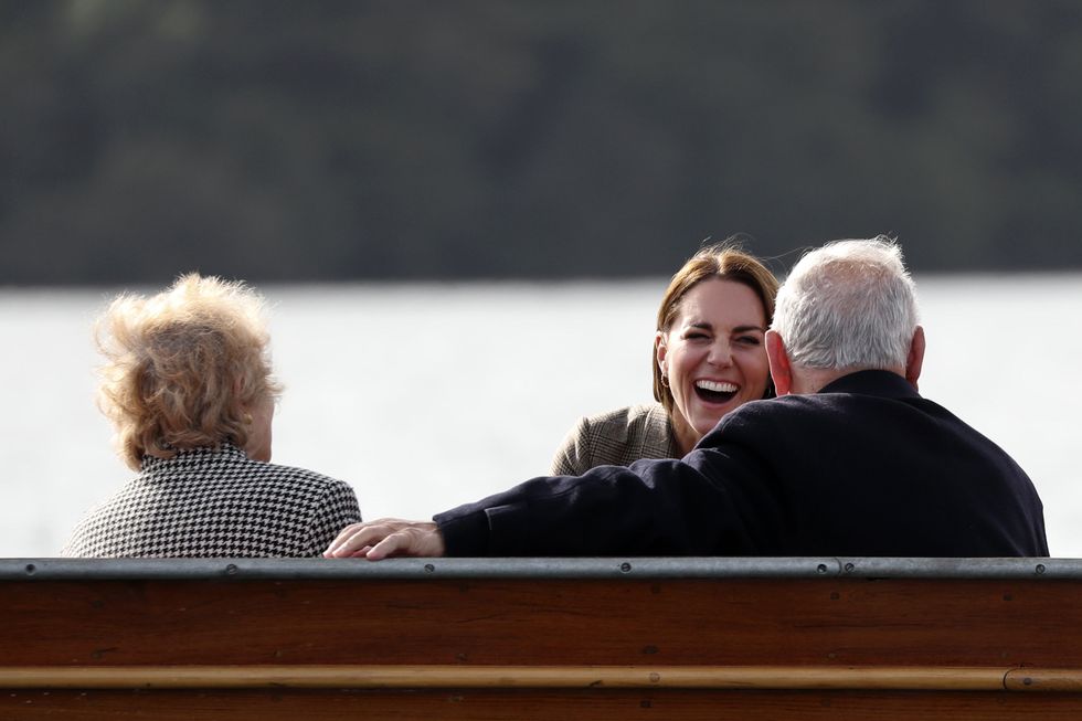 The Duchess of Cambridge (centre) takes a boat trip with Jean Hersh and Arek Hersh on Lake Windermere (Scott Heppell/PA)