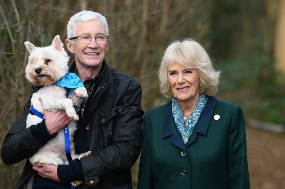 Camilla wins dog loyalty duel with Paul O’Grady at charity centre