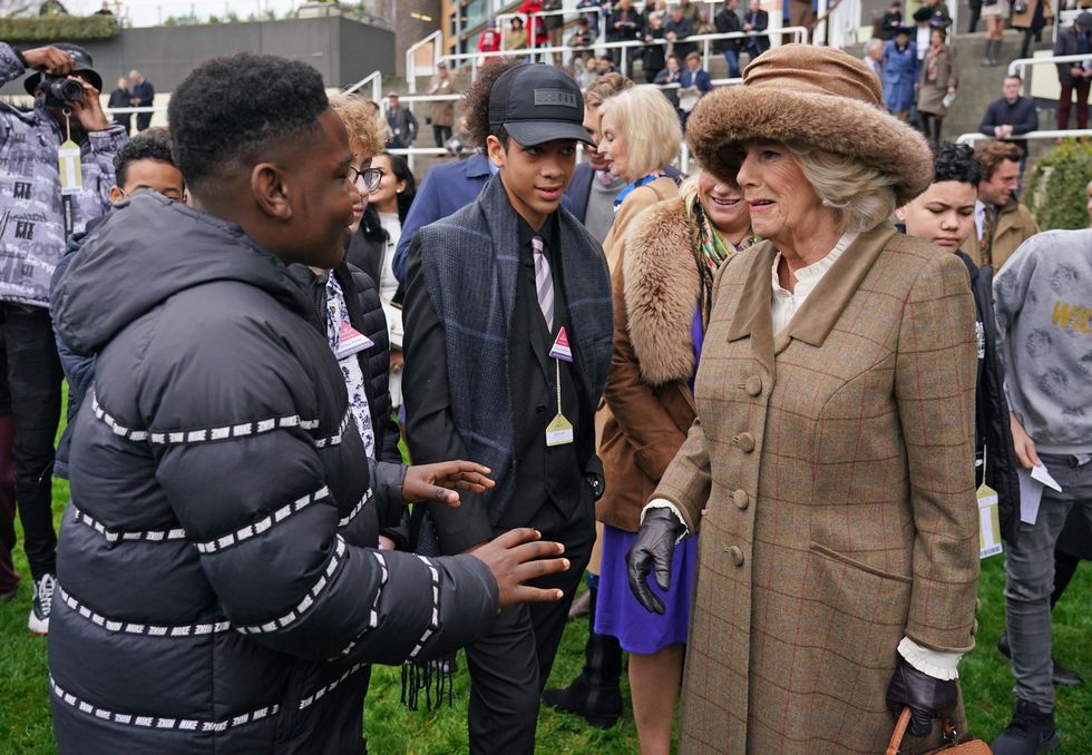 The Duchess of Cornwall meets 15 year old O\u2019Shane, one of Ebony Horse Club students at Ascot\u2019s November racing weekend (Dominic Lipsinki/PA).