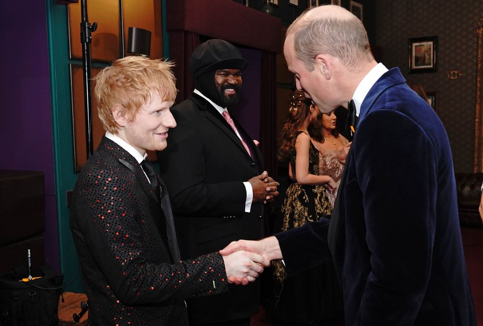 The Duke of Cambridge speaking to Ed Sheeran (Jonathan Brady/PA)