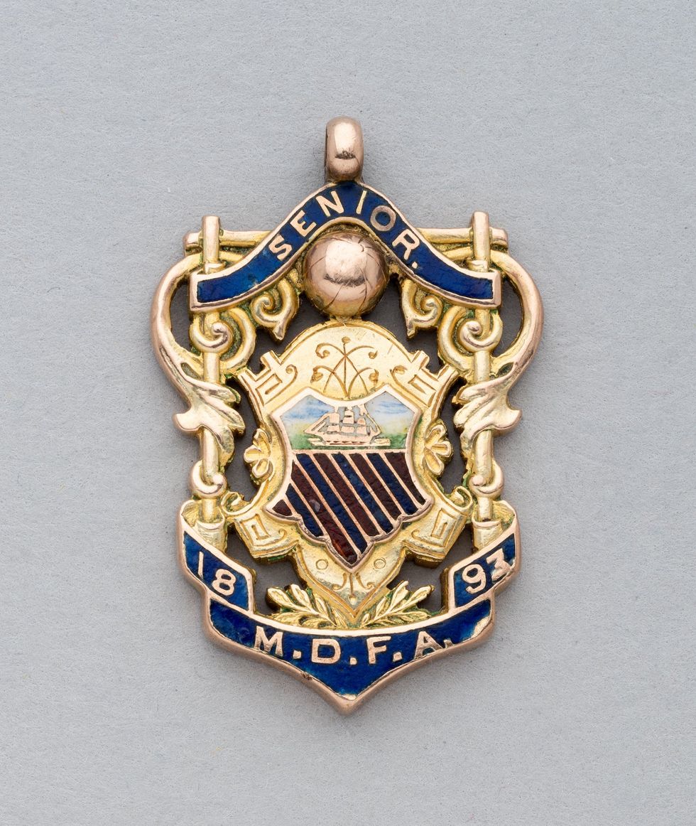 The earliest Manchester United football medal, when the club was known as Newton Heath, is also being sold (Graham Budd Auctions/PA)