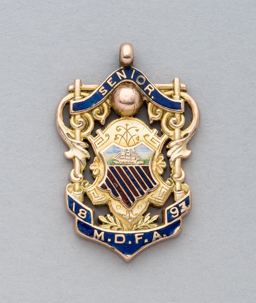 The earliest Manchester United football medal, when the club was known as Newton Heath, is also being sold (Graham Budd Auctions/PA)