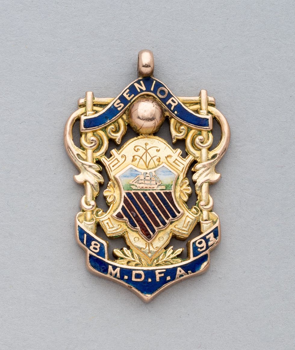 The earliest Manchester United football medal, when the club was known as Newton Heath, sold for \u00a324,100 (Graham Budd Auctions/PA)