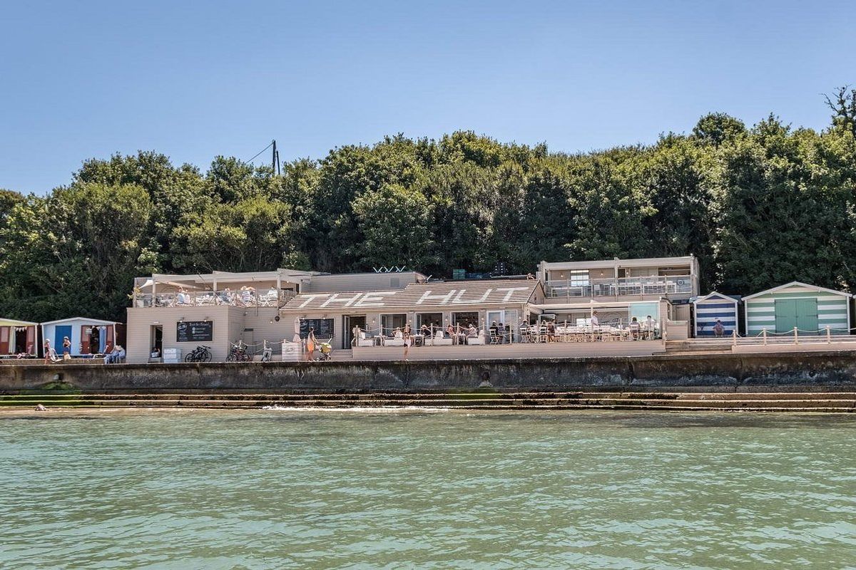 The exterior of The Hut restaurant as seen from the water