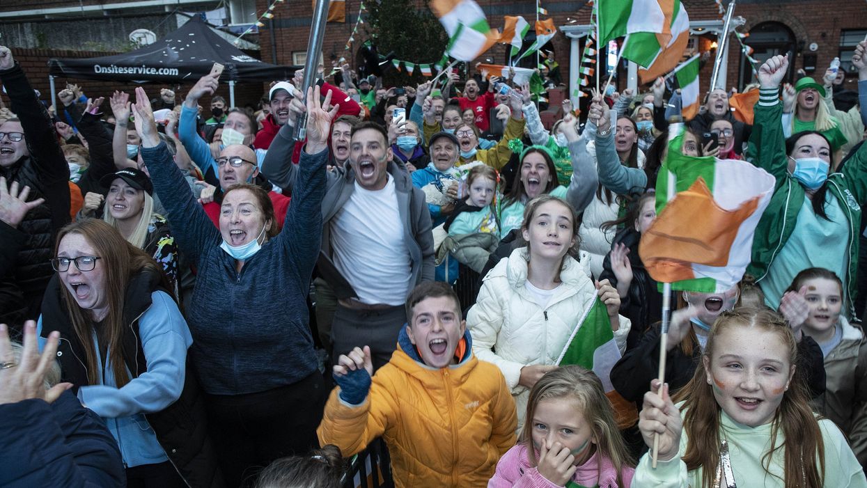The family and friends of Irish boxer Kellie Harrington celebrate her gold medal in Dublin (Damian Eagers/PA)