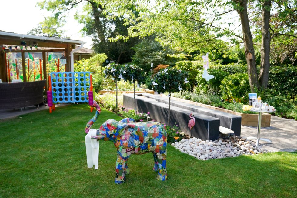 The garden gives children and their families a place to spend time together and have fun (Jacob King/PA)