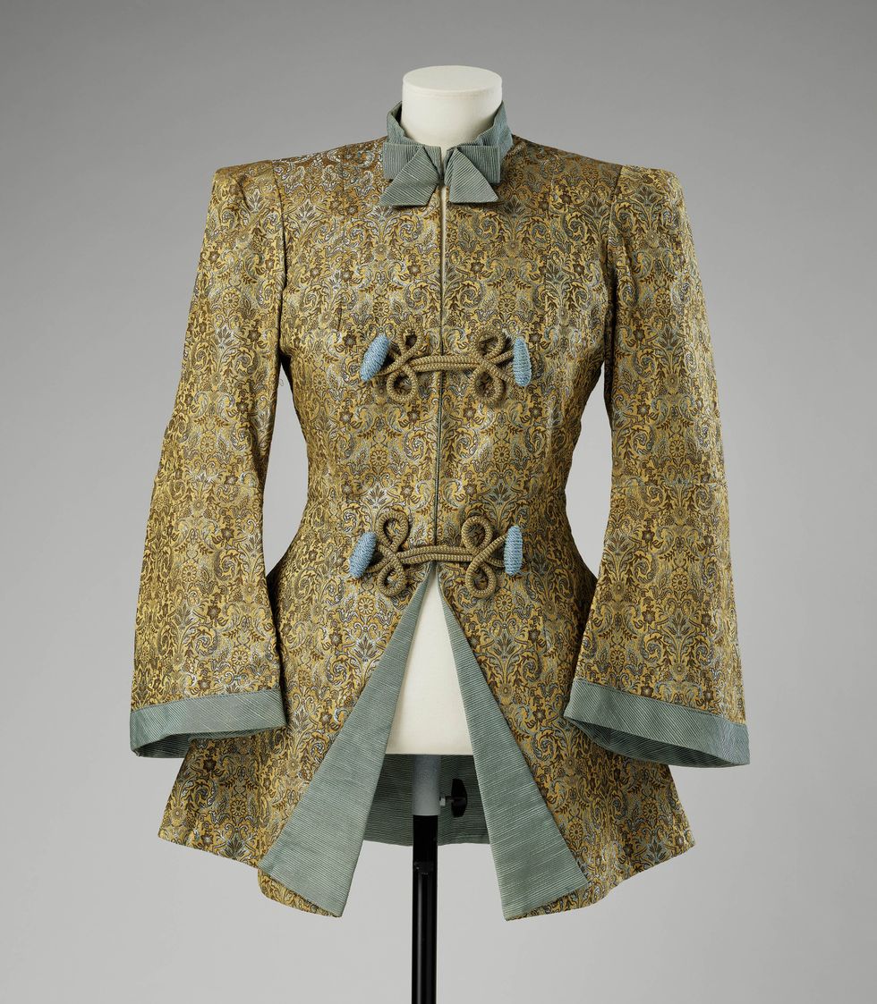 The gold brocade and turquoise jacket, worn by Princess Elizabeth to play Aladdin in 1943 (Royal Collection/PA)