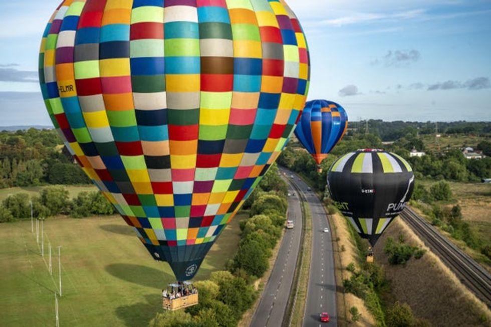 The hot air balloons flew towards Bath, Somerset (Ben Birchall/PA)