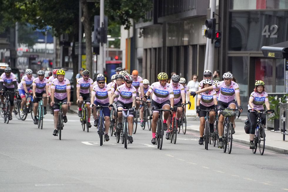 The Jo Cox Way cyclists arrive at Flat Iron Square in Southwark, London, following their five-day journey from West Yorkshire (Steve Parsons/PA)