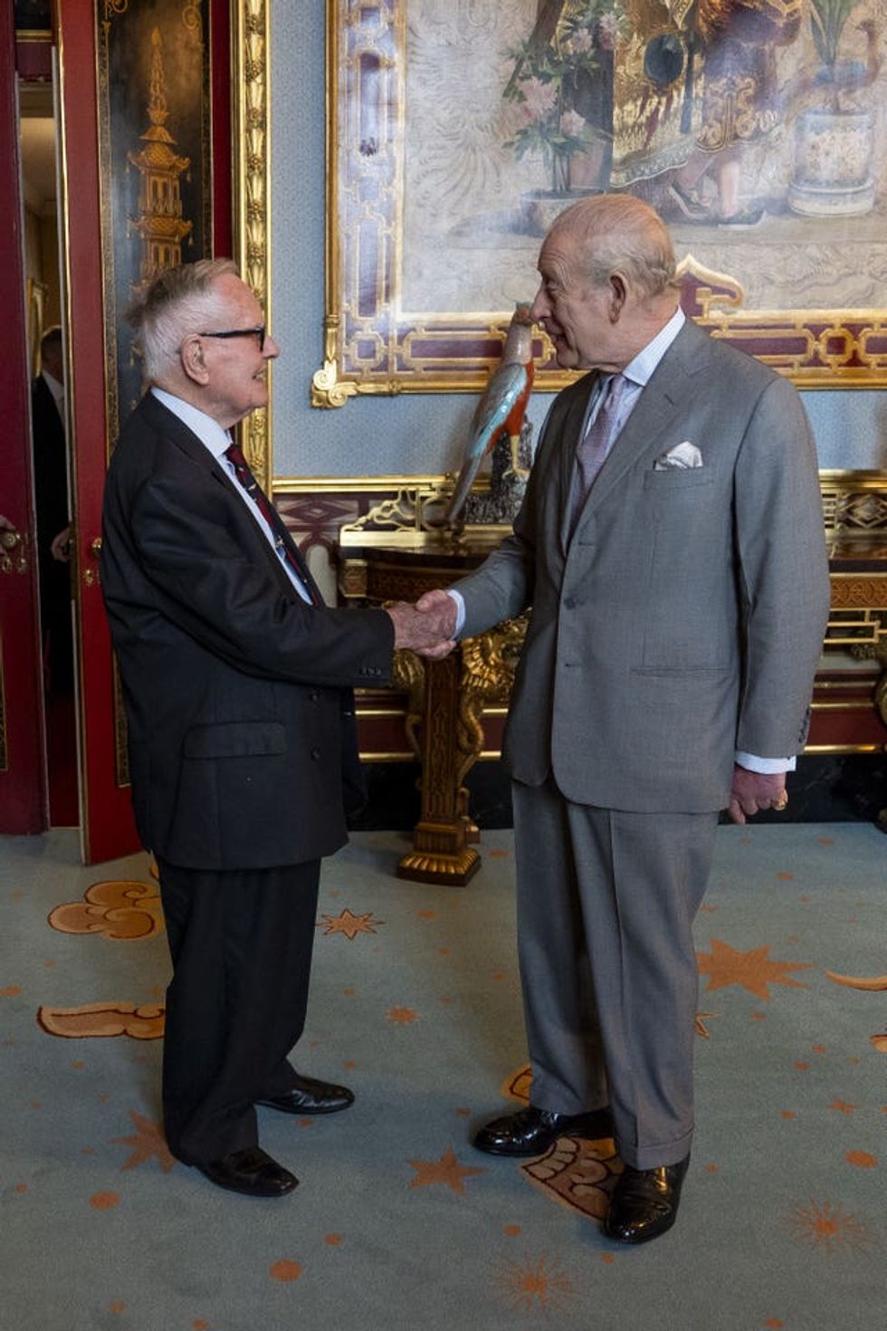 The King and Flt Lt Bell chat during their meeting on Wednesday