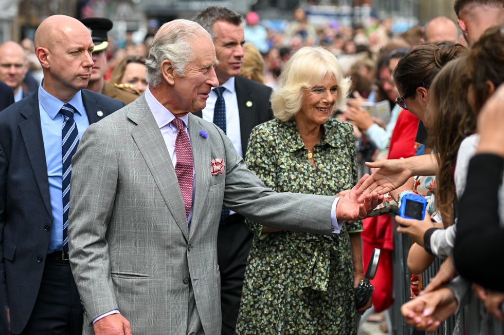 King and Queen make waves at the seaside on Cornwall trip