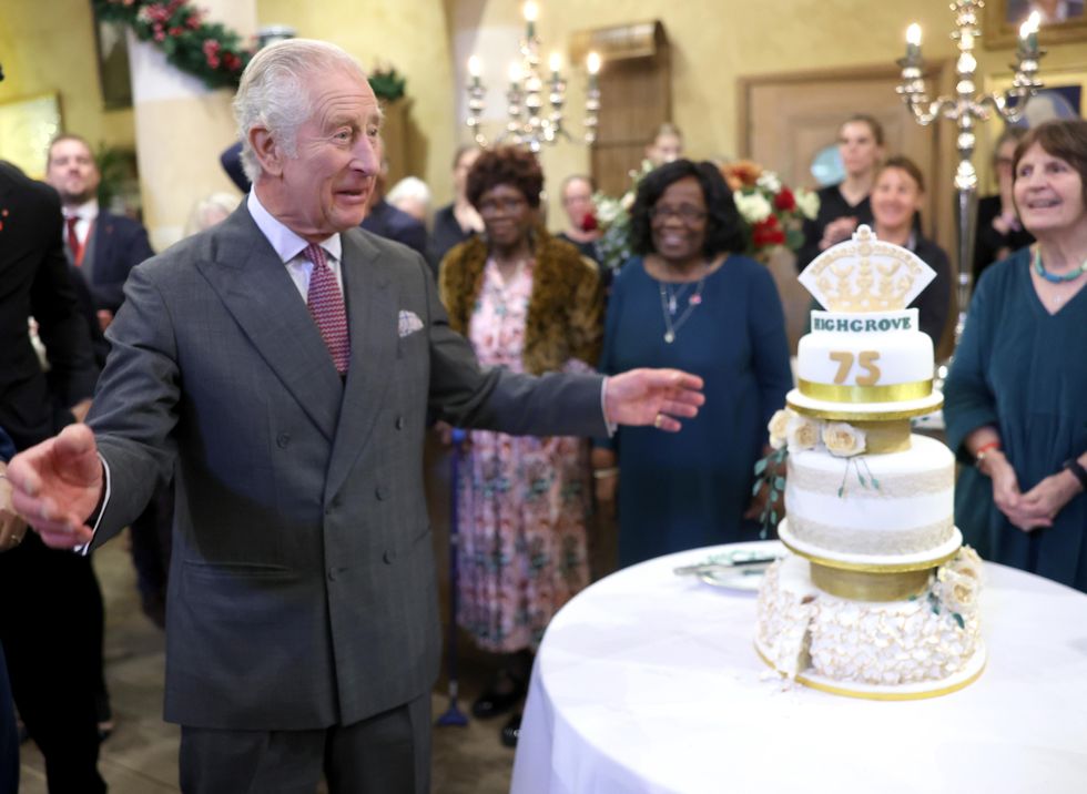 King marks 75th birthday a day early with three-tiered cake at Highgrove