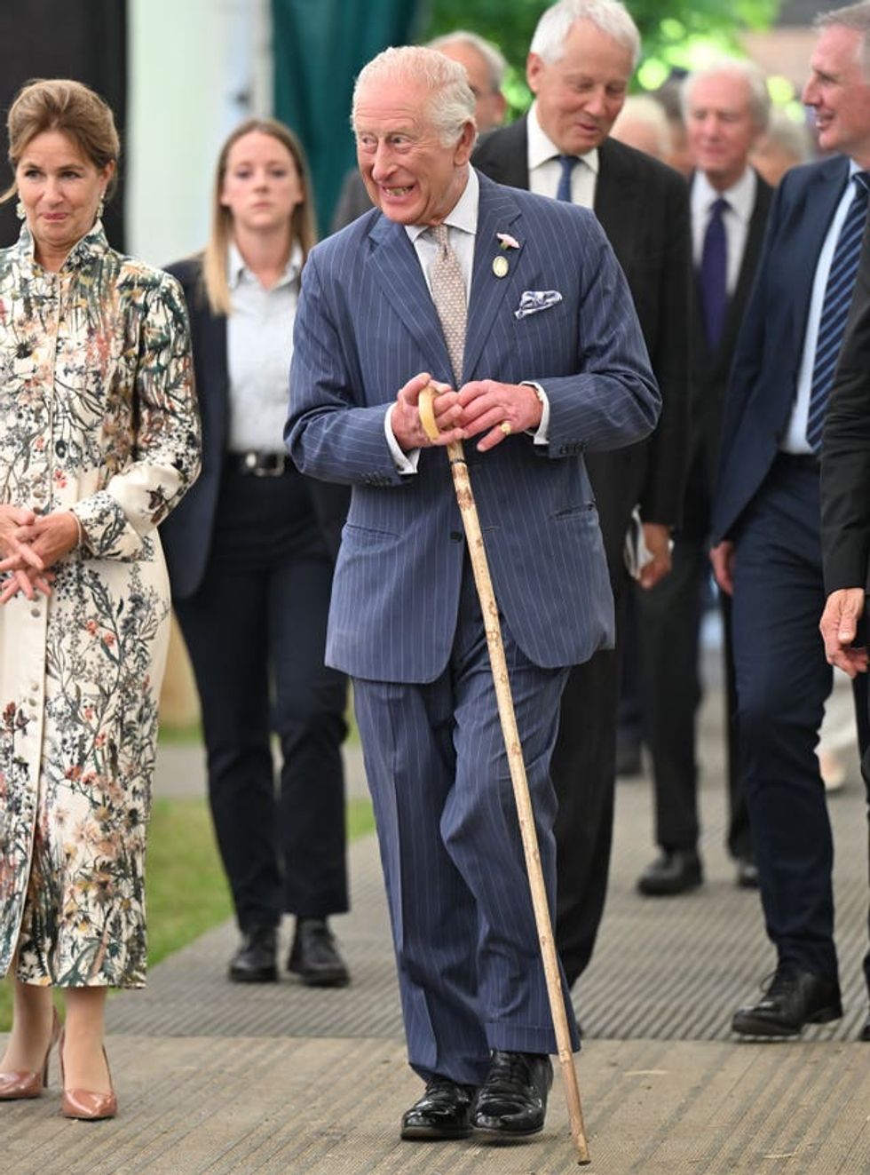 The King carried a shepherd's crook during his visit