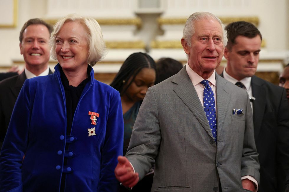 King celebrates 75th birthday by chatting to hundreds of NHS nurses