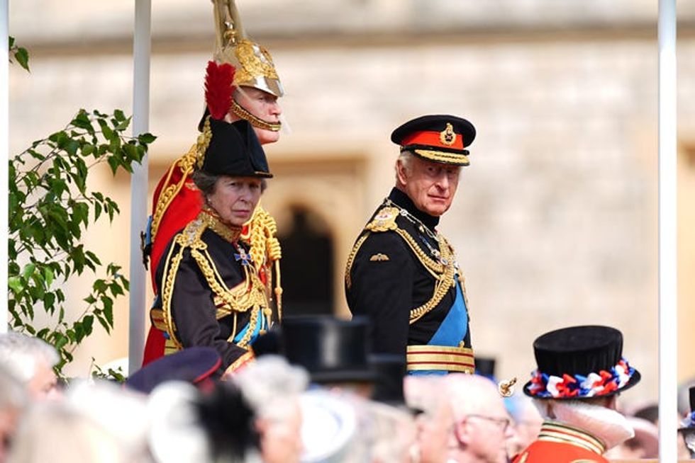 The King, Colonel in Chief, The Household Cavalry, and the Princess Royal, Colonel The Blues and Royals, attending the presentation of new standards to The Life Guards and the Blues and Royals at Windsor Castle, Berkshire