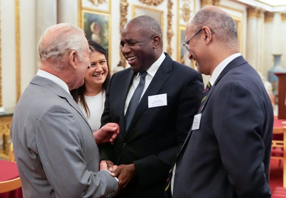 The King, David Lammy and Lisa Nandy laughing while chatting