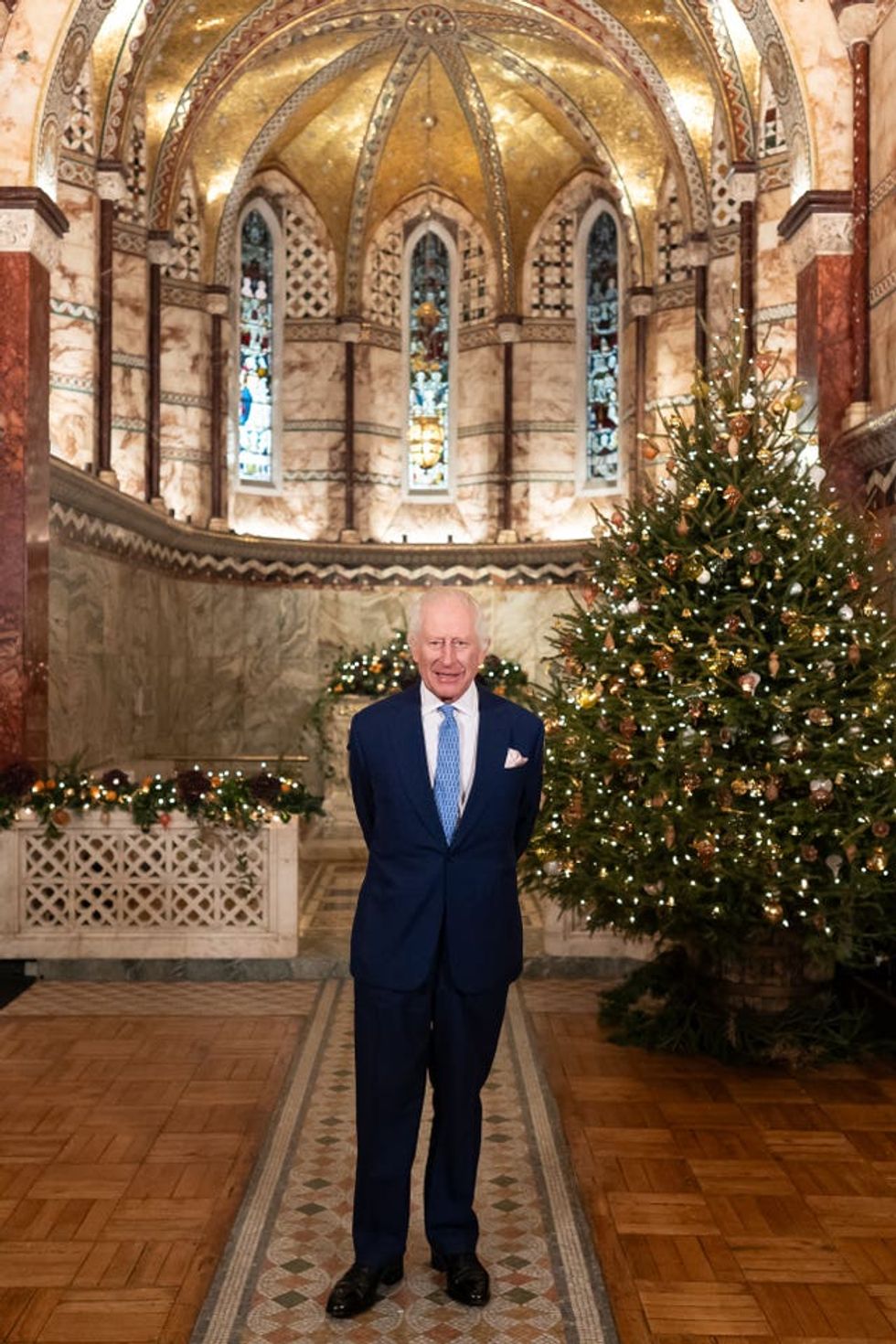 The King during the recording of his Christmas message at the Fitzrovia Chapel in central London
