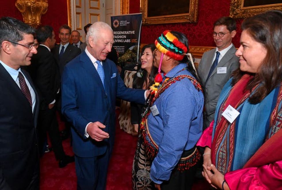 The King meets Uyunkar Domingo Peas Nampichkai at the launch of the Circular Bioeconomy Alliance at St James\u2019s Palace in London
