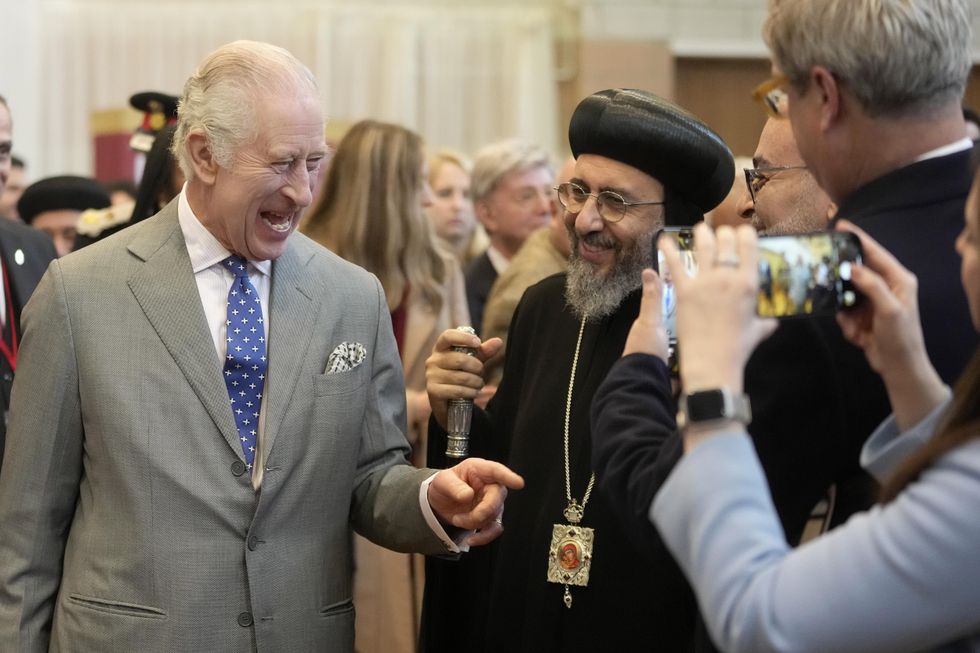 Charles given handwritten Christmas letter by six-year-old girl on church visit