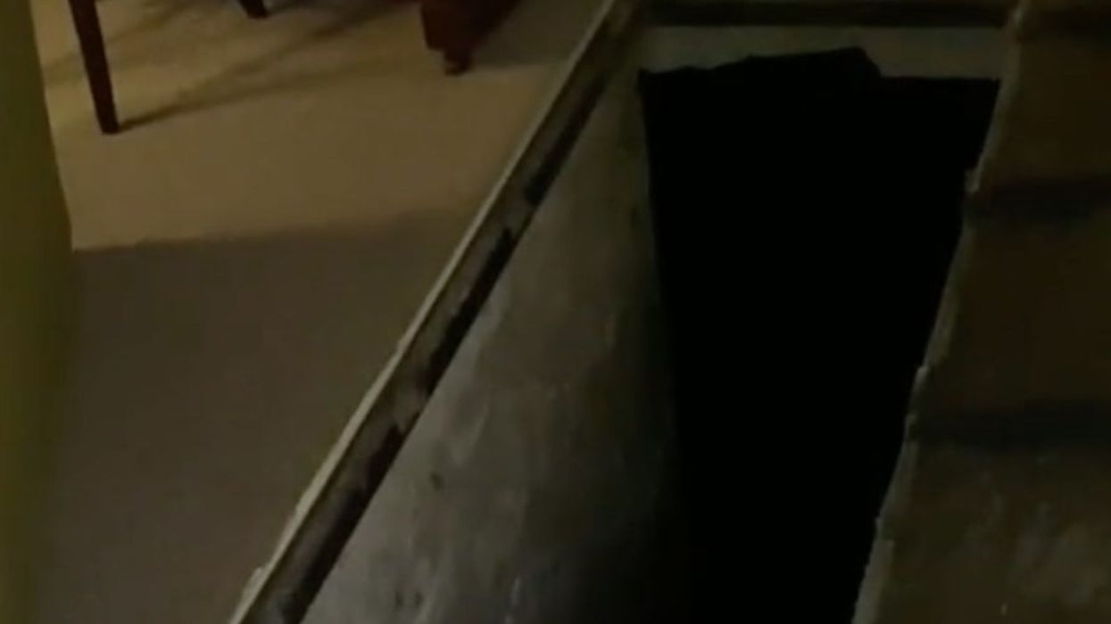 <p>The Lake District rental had a spooky old door in the middle of the floor</p>